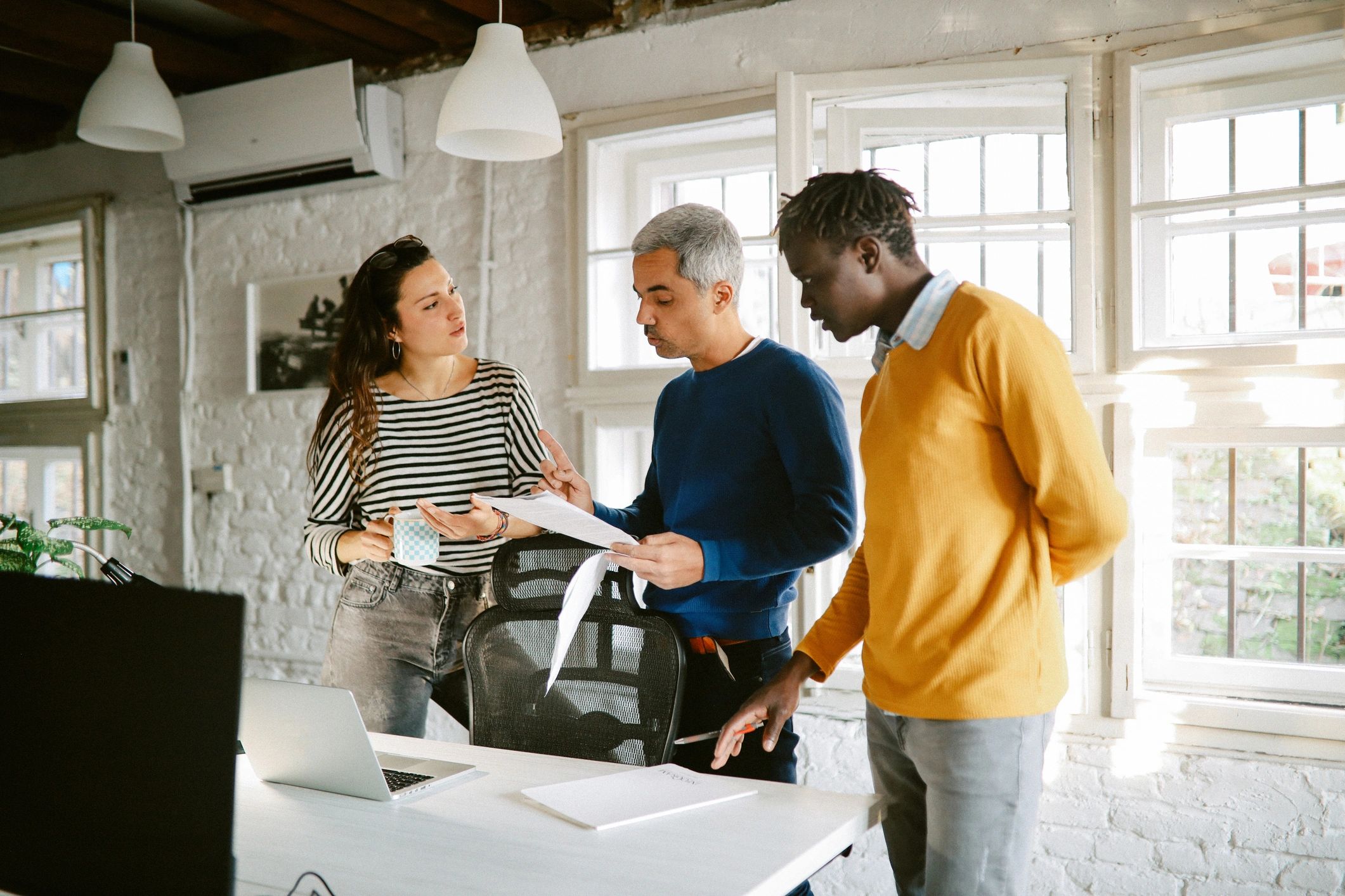 Modern team workspace representing AI-assisted customer conversion support