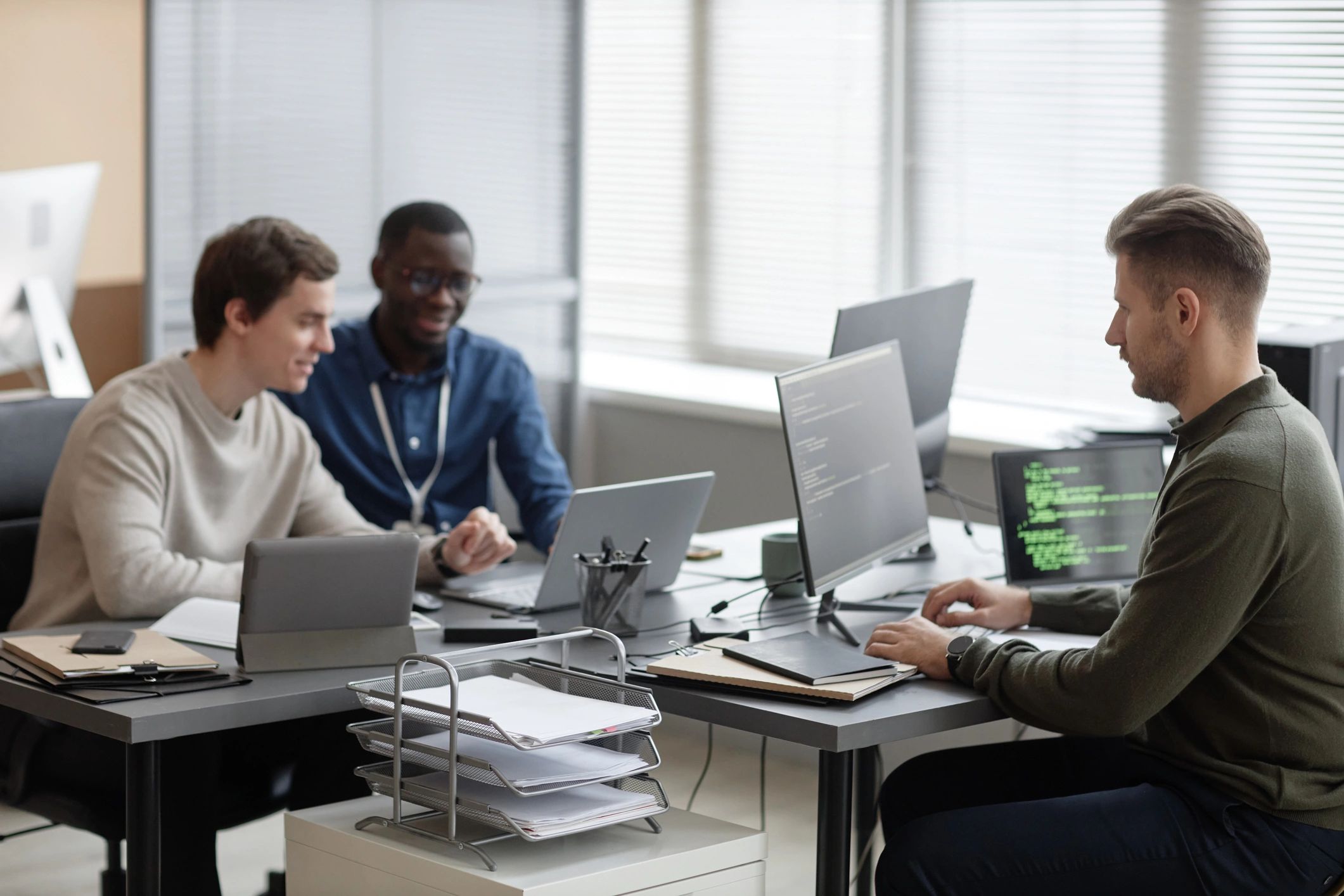 Technology team working together in an office